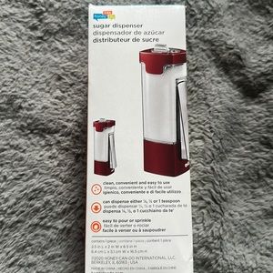 Sugar dispenser clean convenient and easy to use brand new inbox. Easy to pour